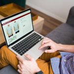Что лучше продавать на маркетплейсах: советы новичкам adult-man-doing-online-shopping-during-a-leisure-day-at-home-young-man-buying-clothes-online-7683985