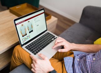 Что лучше продавать на маркетплейсах: советы новичкам adult-man-doing-online-shopping-during-a-leisure-day-at-home-young-man-buying-clothes-online-7683985